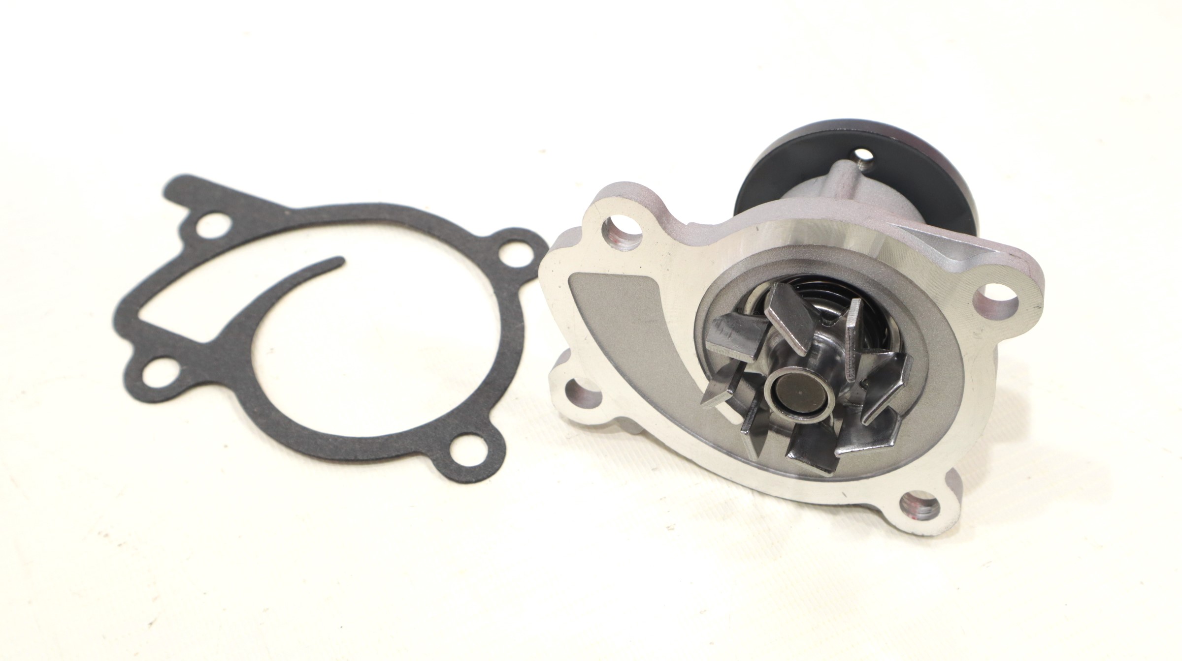 Насос водяной NISSAN QASHQAI/TIIDA 07- 1.6 TATSUMI